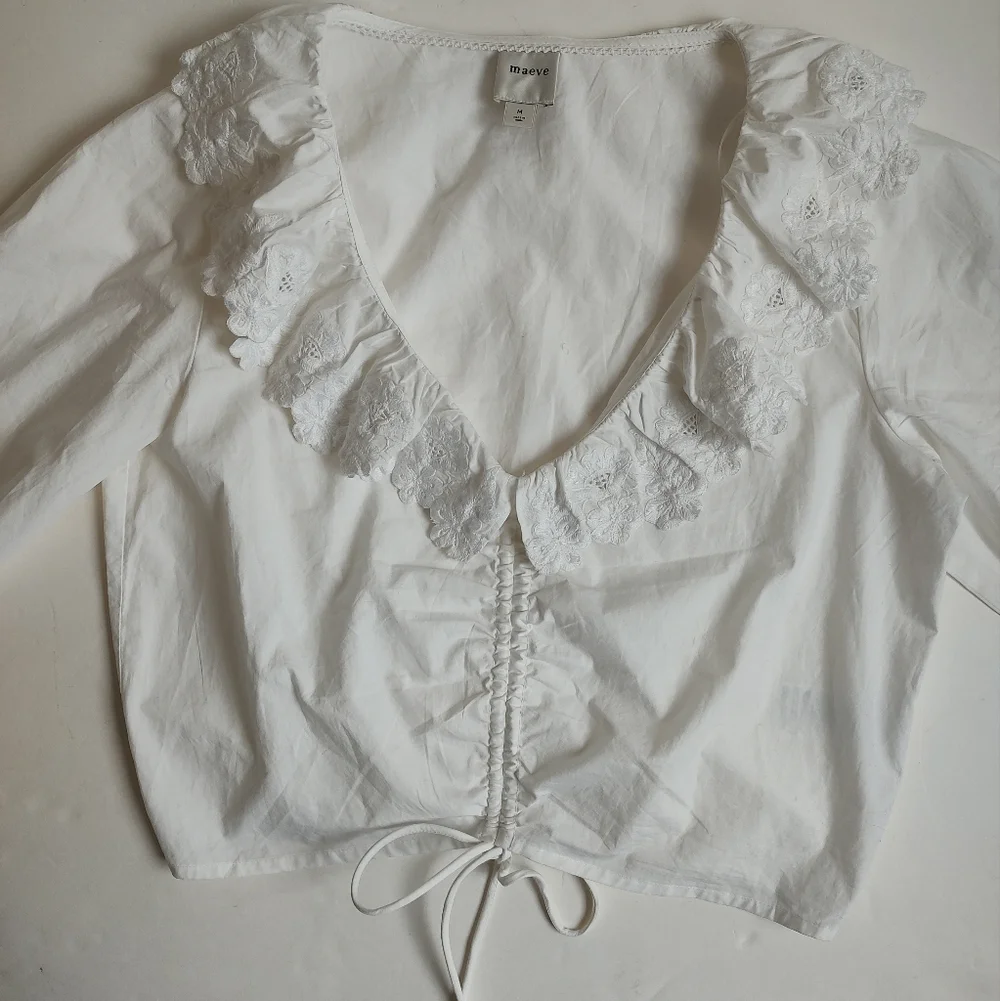 Maeve White Ruffled V-Neck Drawstring Blouse